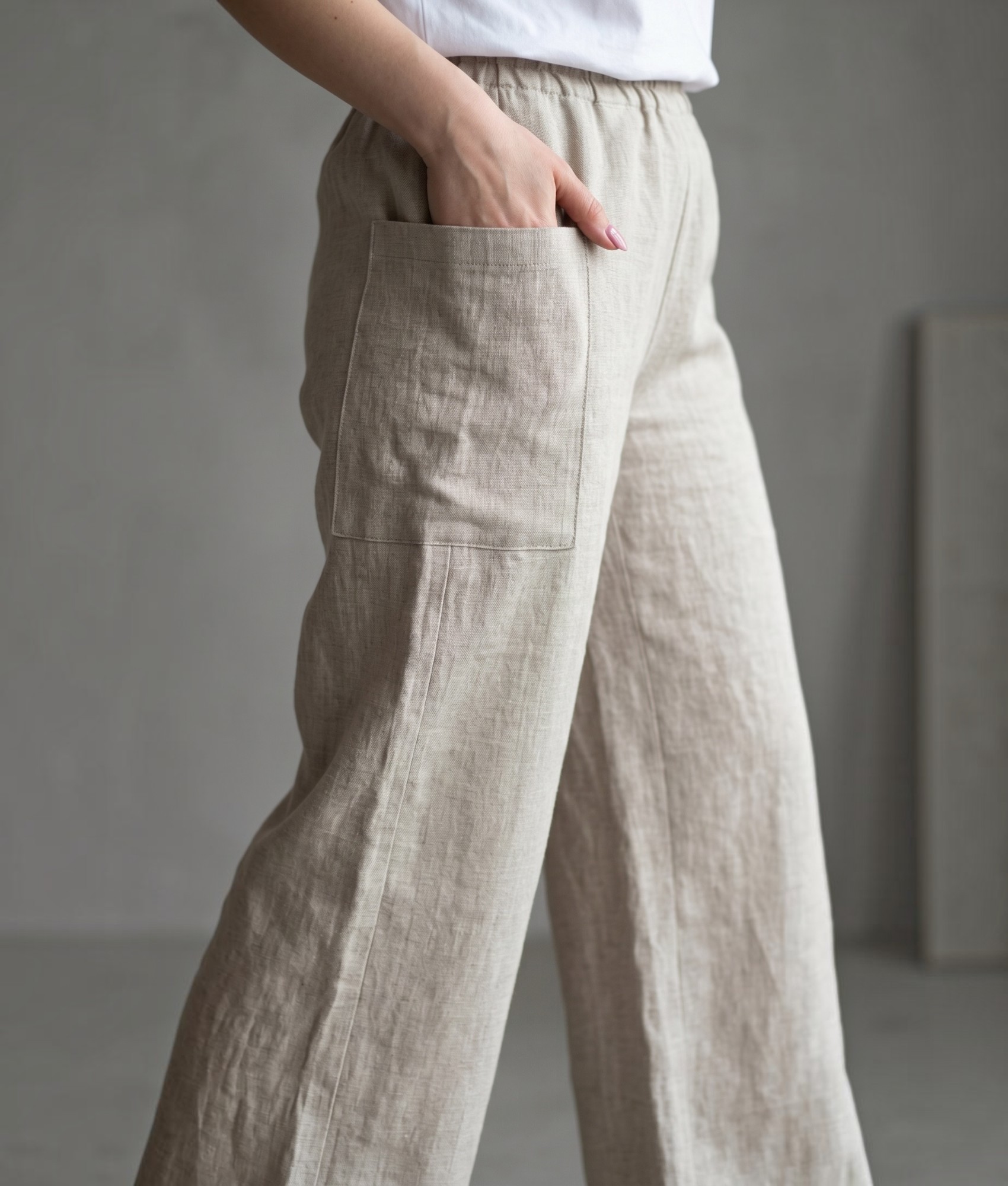 naturalaus lino kelnes